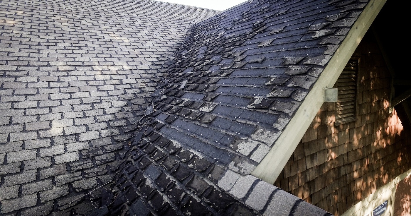 Rotten shingles on a roof