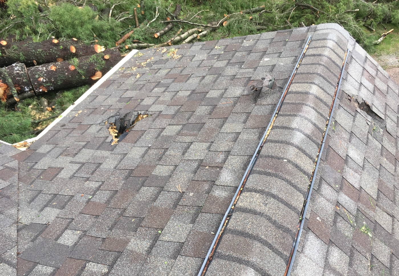 Asphalt Shingle Roof With Storm Damage