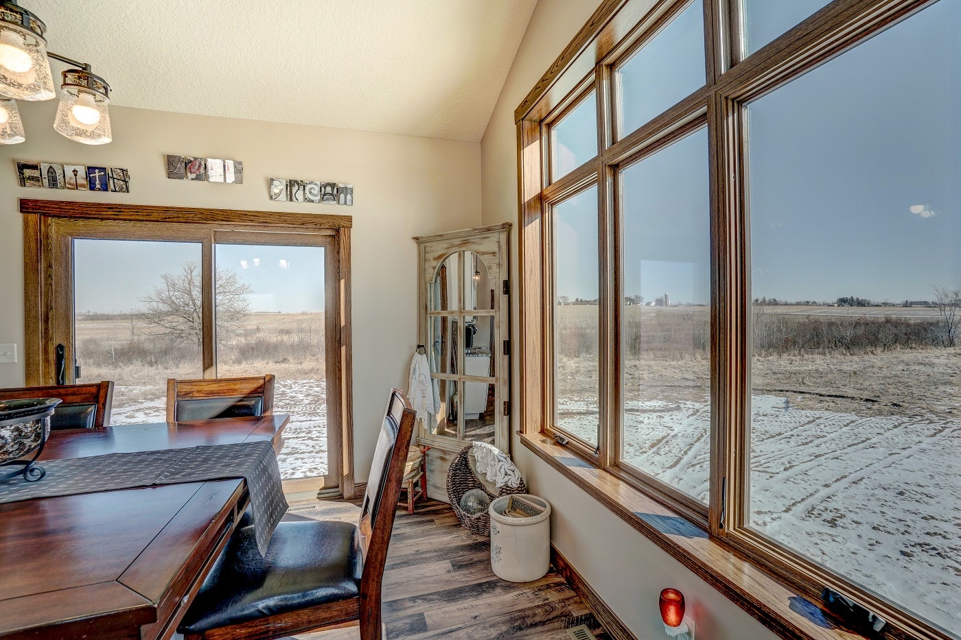 Home with large picture windows in winter