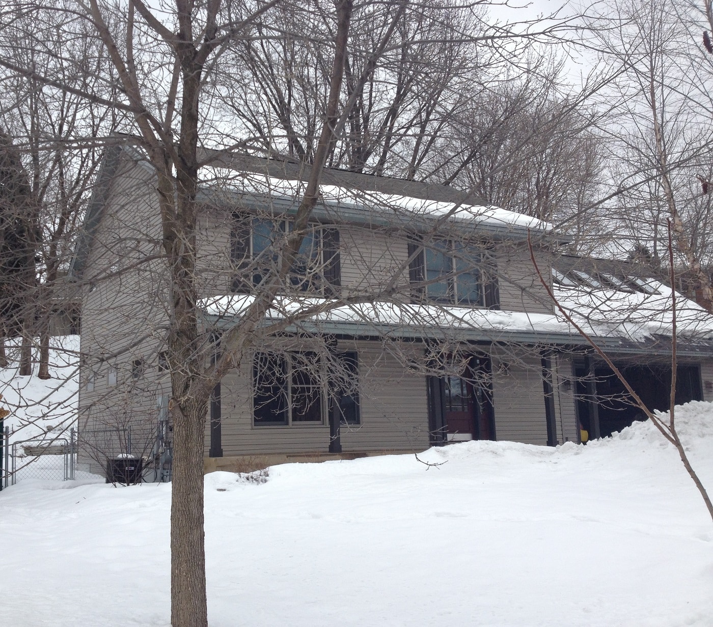 Minnesota home in winter covered with snow 
