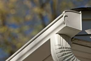 Rain Gutters With a Built-In Protective Cover