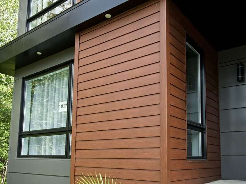 Contemporary Home With Attractive Brown and Gray Steel Siding