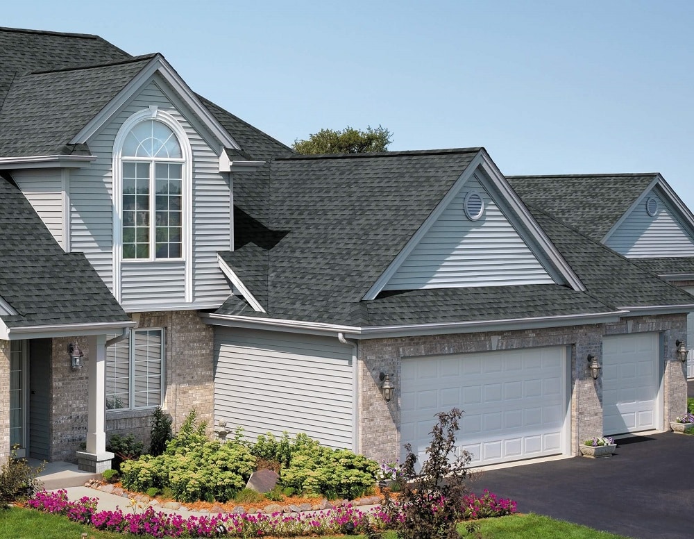 Picture of asphalt shingle roofing on a home.
