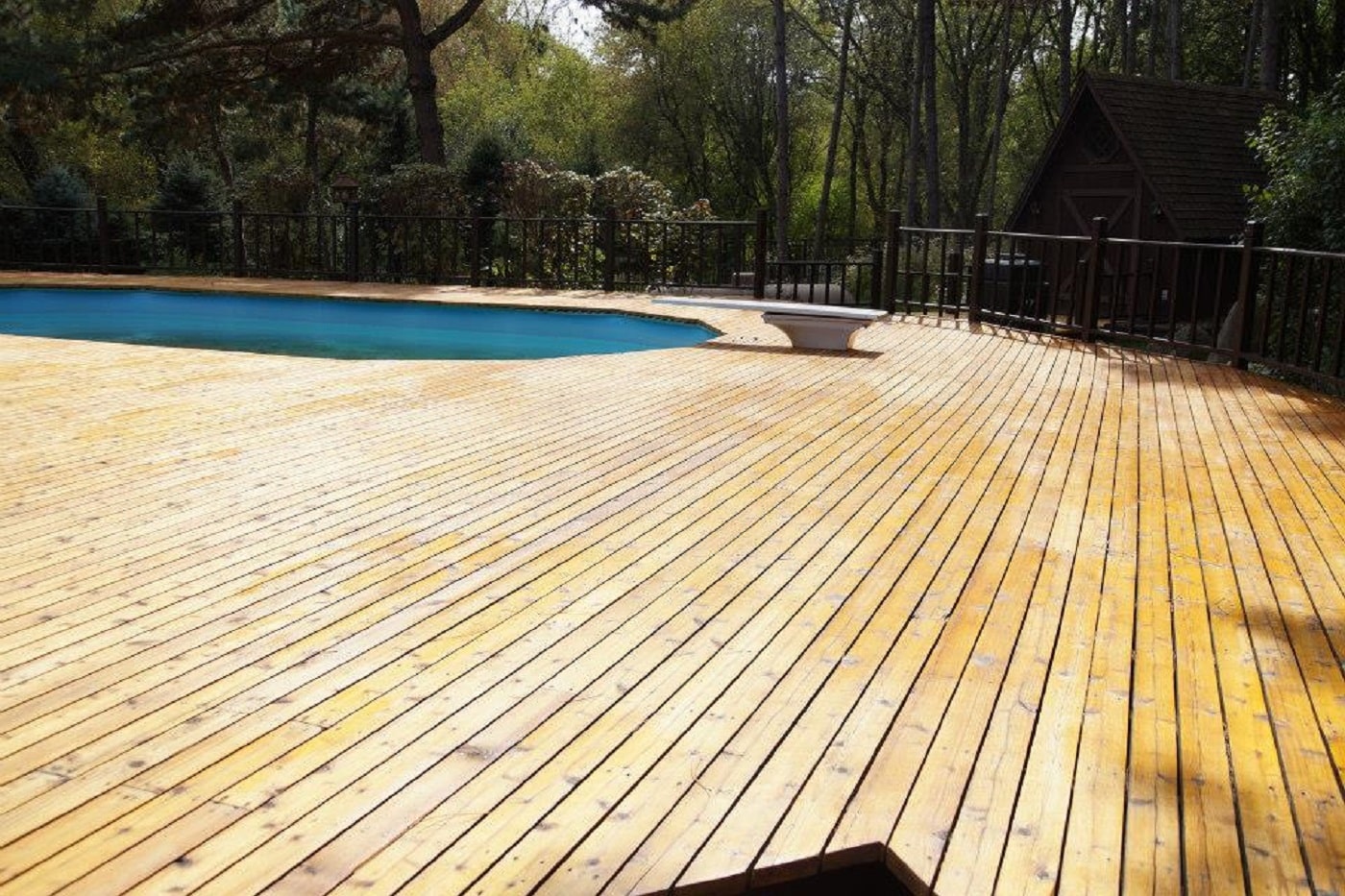 Cedar deck boards around a swimming pool.