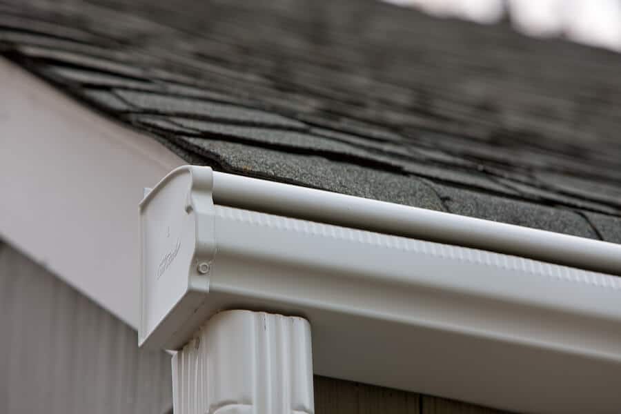 Picture of LeafGuard® Brand Gutters attached to a home with a shingle roof.