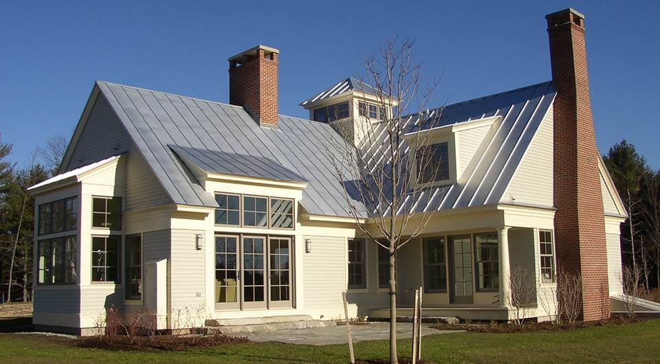 Picture of a house with metal roofing.