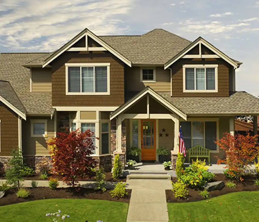 Picture of a house with an asphalt shingle roof.