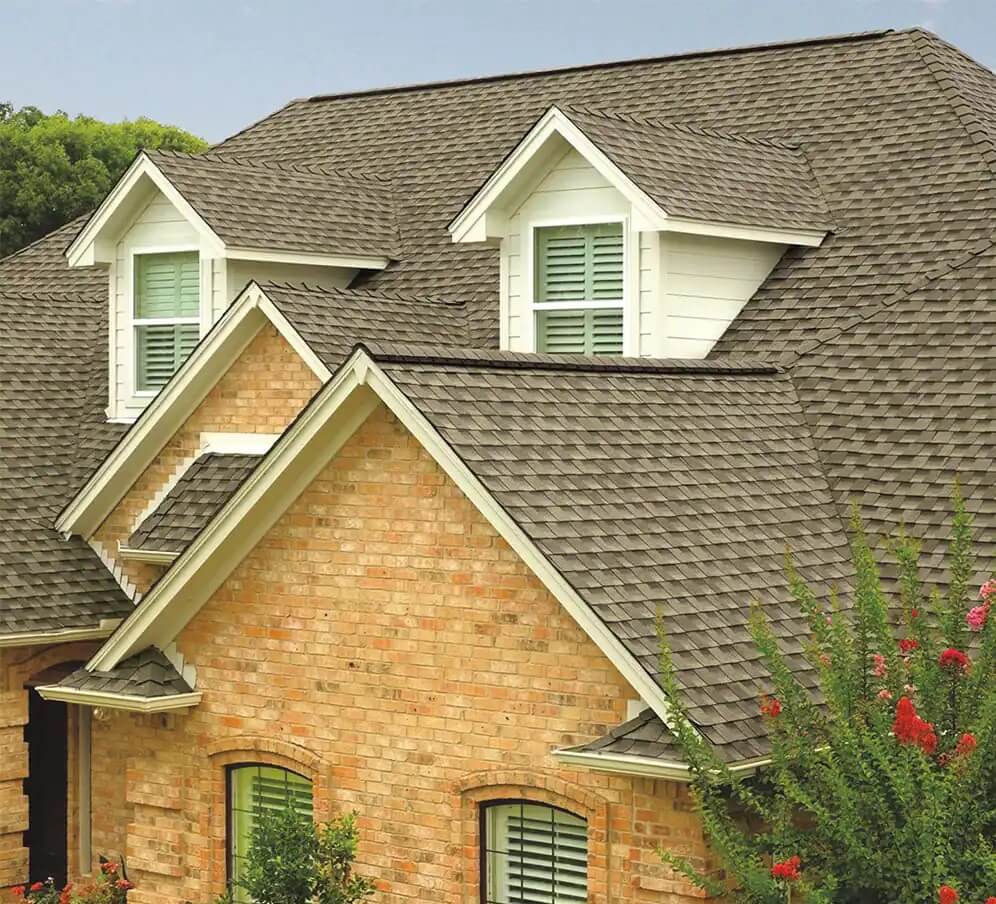 Picture of a house with an asphalt shingle roof.