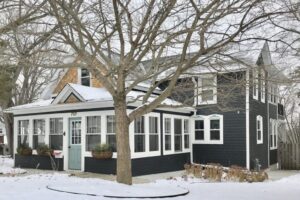 gray replacement siding house in winter